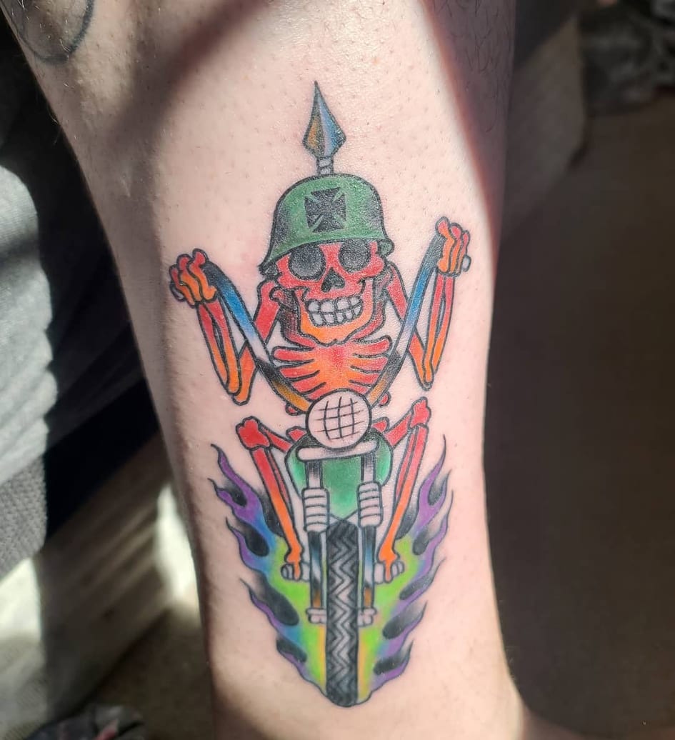 Colorful skeleton motorcycle on fire rainbow Tattoo Design Good Times Tattoo Seattle