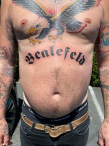 Large traditional text stomach Tattoo Design Good Times Tattoo Seattle